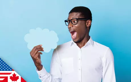 Man holding paper cut-out of a cloud and looking surprised and excited