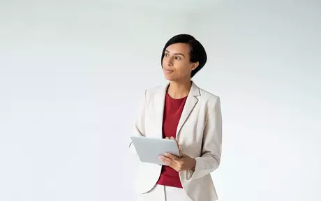 business woman holding tablet